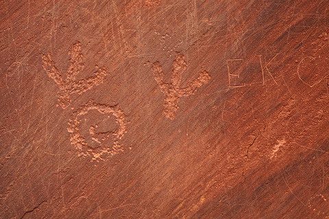 These petroglyphs have been vandalized. Please be considerate and don't ever touch rock art or graffiti it. Zion National Park - April 11, 2009.